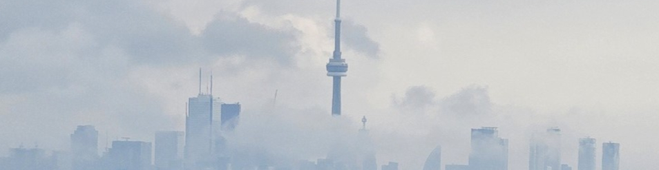 CN tower above fog